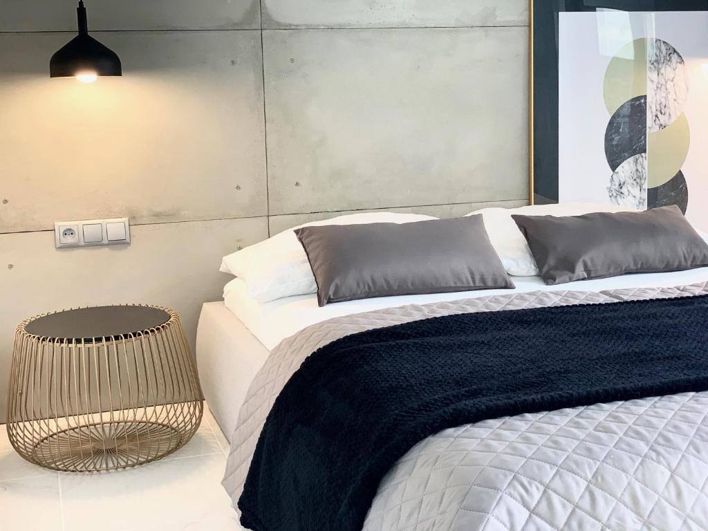 Posteľ alebo postele v izbe v ubytovaní EL Apartments - Antares