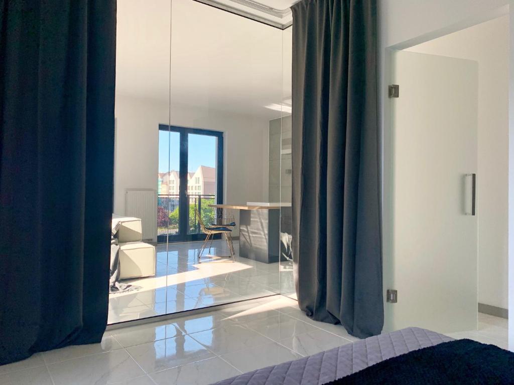 Posteľ alebo postele v izbe v ubytovaní EL Apartments - Antares