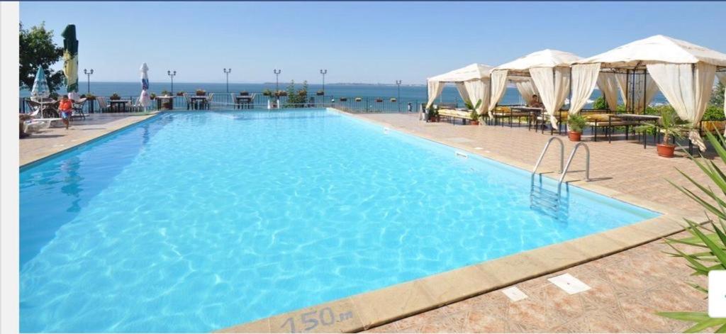 The swimming pool at or close to Dolce Vita sea view apartment