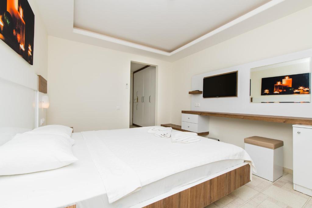 Телевизор и/или развлекательный центр в Soothe Hotel