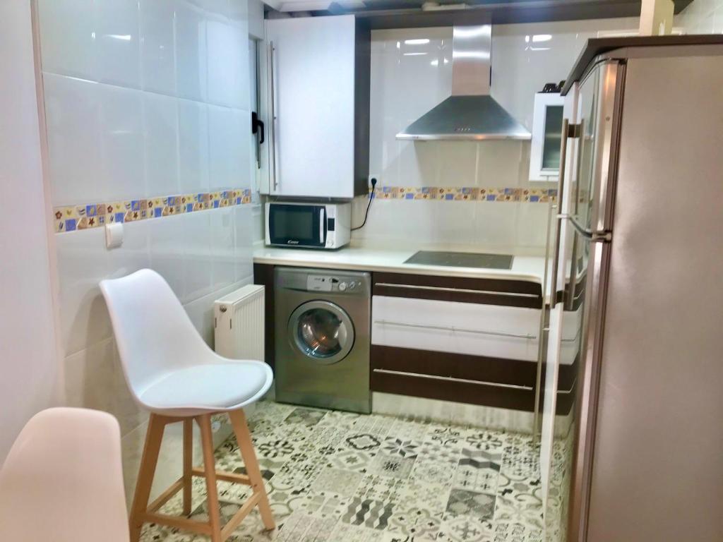 Kuchyň nebo kuchyňský kout v ubytování El apartamento de Andrea