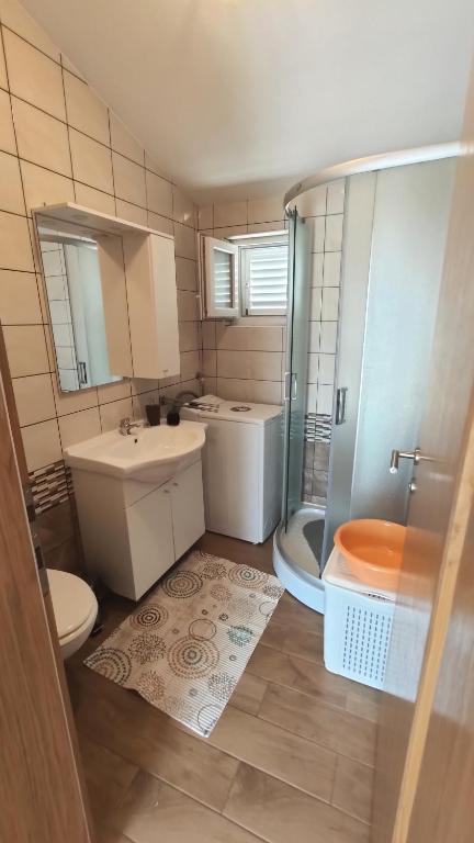 Koupelna v ubytování Apartmani Andrea
