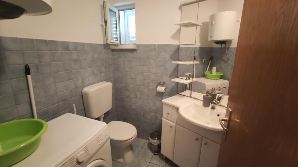 Koupelna v ubytování Apartmani Andrea