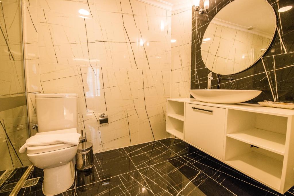 Ванная комната в Soothe Hotel
