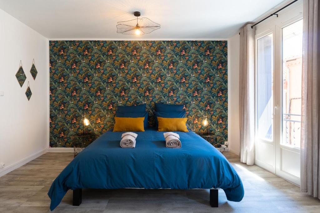 Postel nebo postele na pokoji v ubytování Maison La Majorelle - 90m2 - Garage et Terrasse
