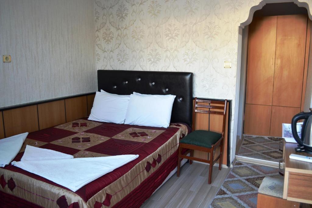 Giường trong phòng chung tại Aspawa Hotel