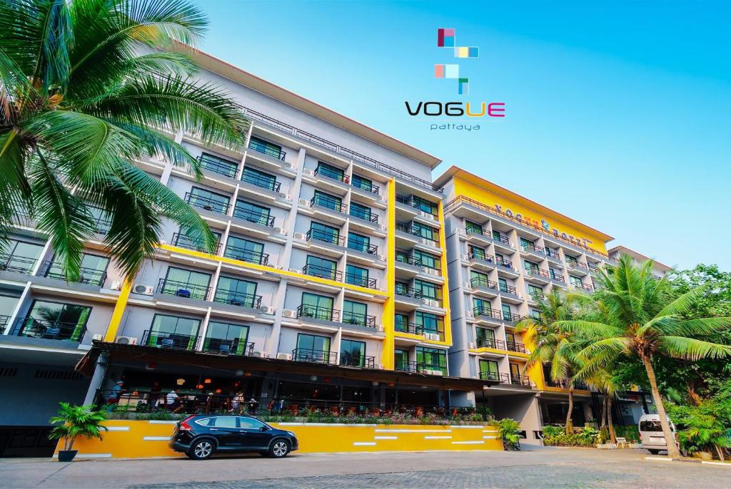 a car parked in front of a hotel at Vogue Pattaya Hotel in Pattaya