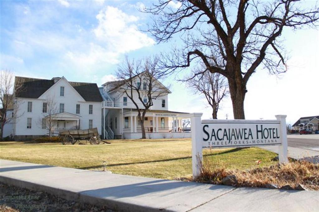 a house with a sign on the front of it at The Sacajawea Hotel in Three Forks