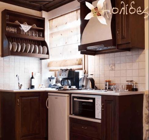 Kuchyň nebo kuchyňský kout v ubytování Aiolides Traditional Homes
