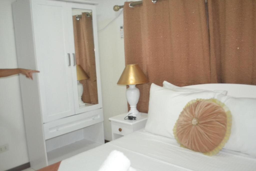 Postel nebo postele na pokoji v ubytování Villa Prescilla