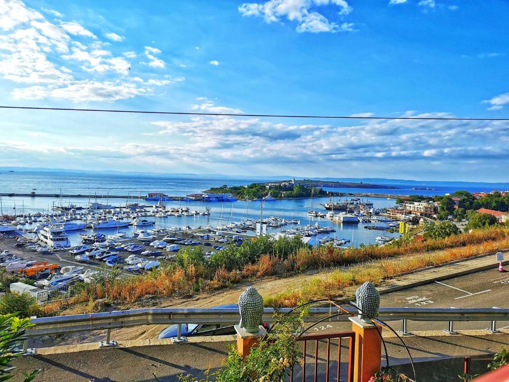 a view of a harbor with boats in the water at Villa Victoria - a luxury appartment with icredible Seaview in Sozopol