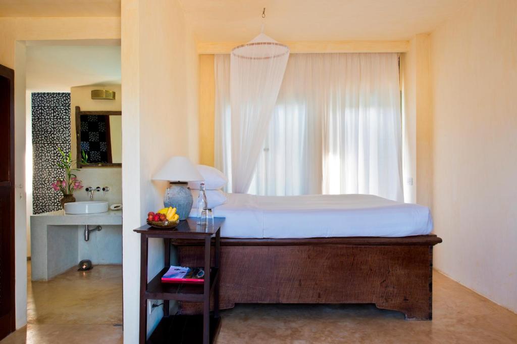 Postel nebo postele na pokoji v ubytování Knai Bang Chatt Resort