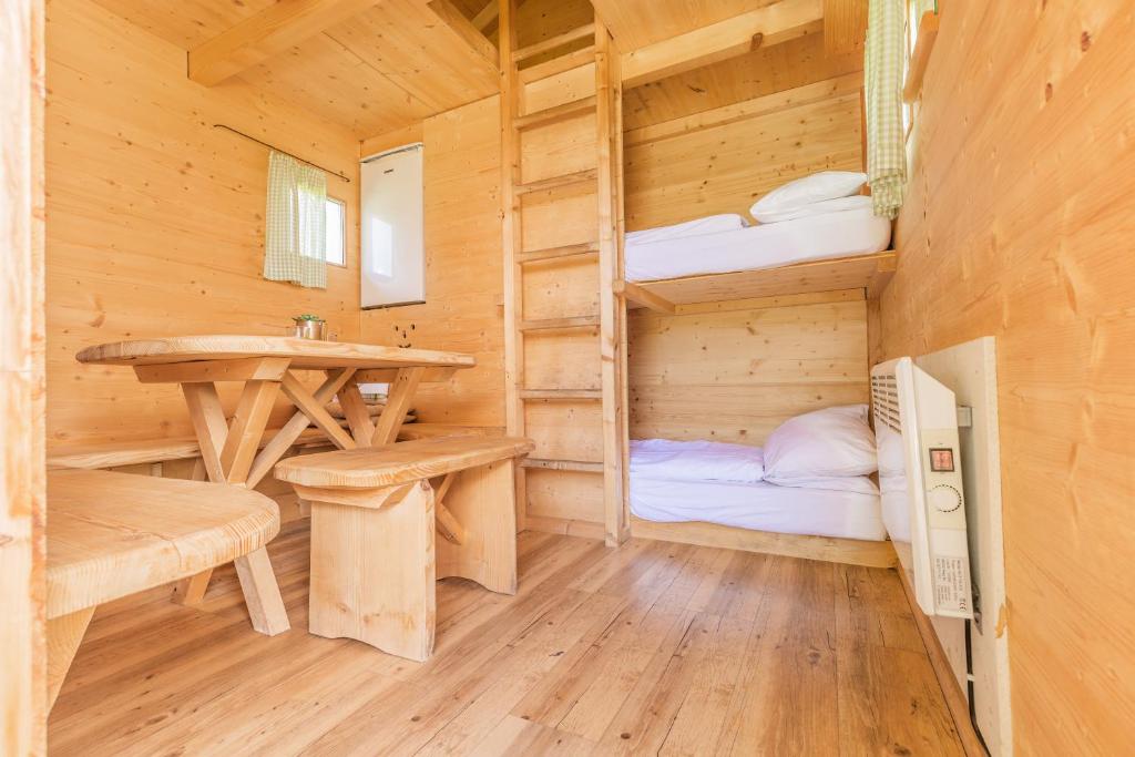 Postel nebo postele na pokoji v ubytování Almdorado
