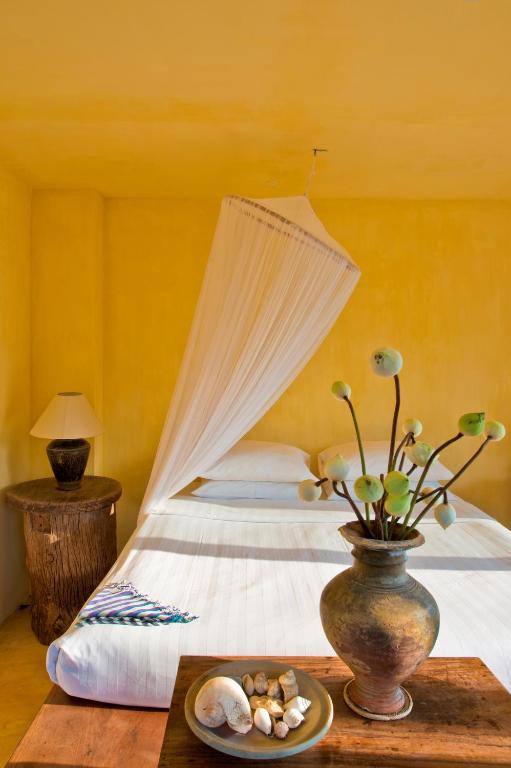 Postel nebo postele na pokoji v ubytování Knai Bang Chatt Resort