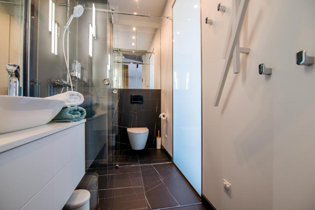 Kúpeľňa v ubytovaní Apartament WIDOK