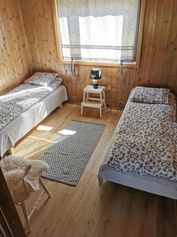 Postel nebo postele na pokoji v ubytování Sunset puhkemaja