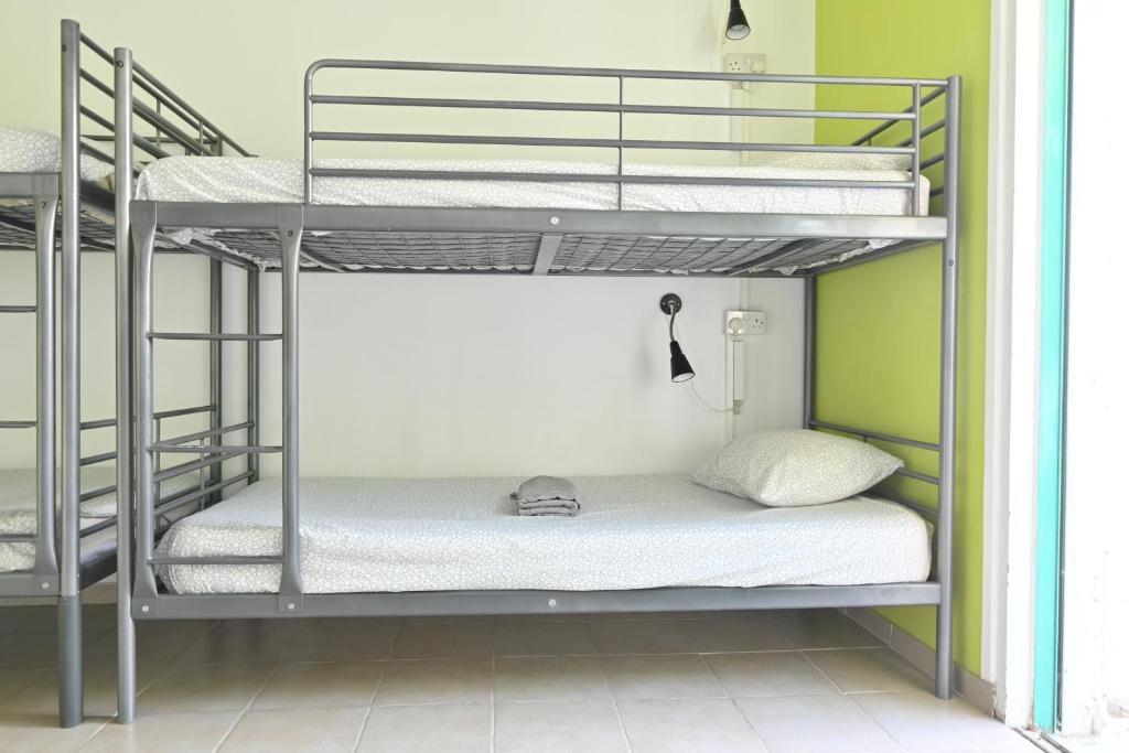 Postel nebo postele na pokoji v ubytování Lemongrass Hostel