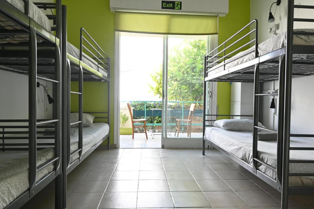 Postel nebo postele na pokoji v ubytování Lemongrass Hostel