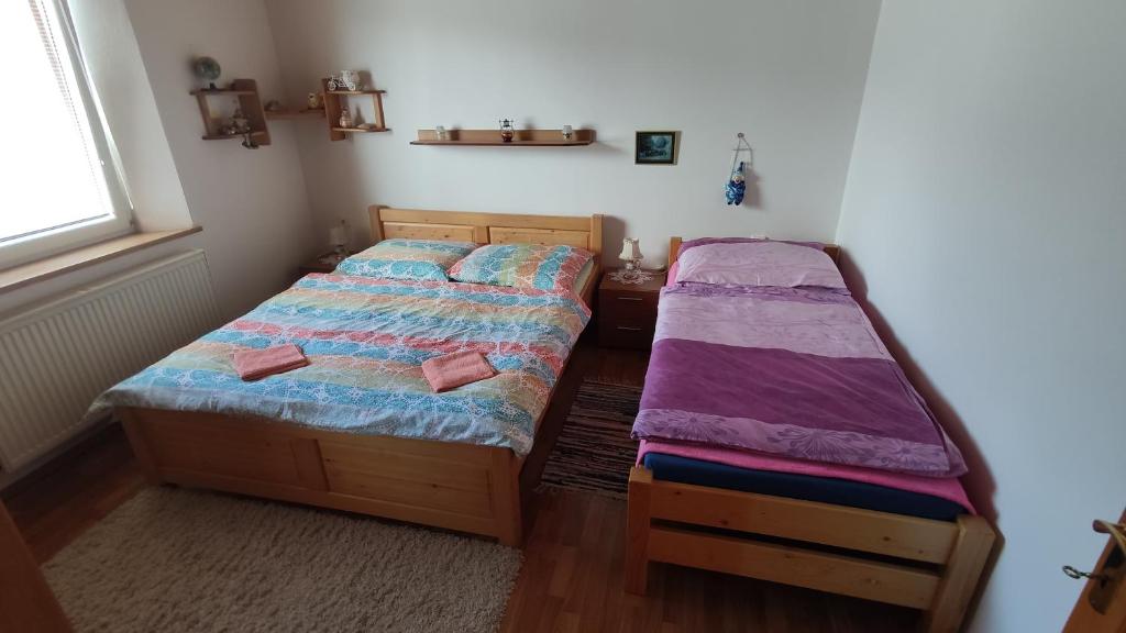 Postel nebo postele na pokoji v ubytování Privat BEA