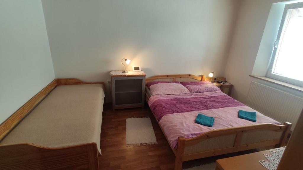 Postel nebo postele na pokoji v ubytování Privat BEA