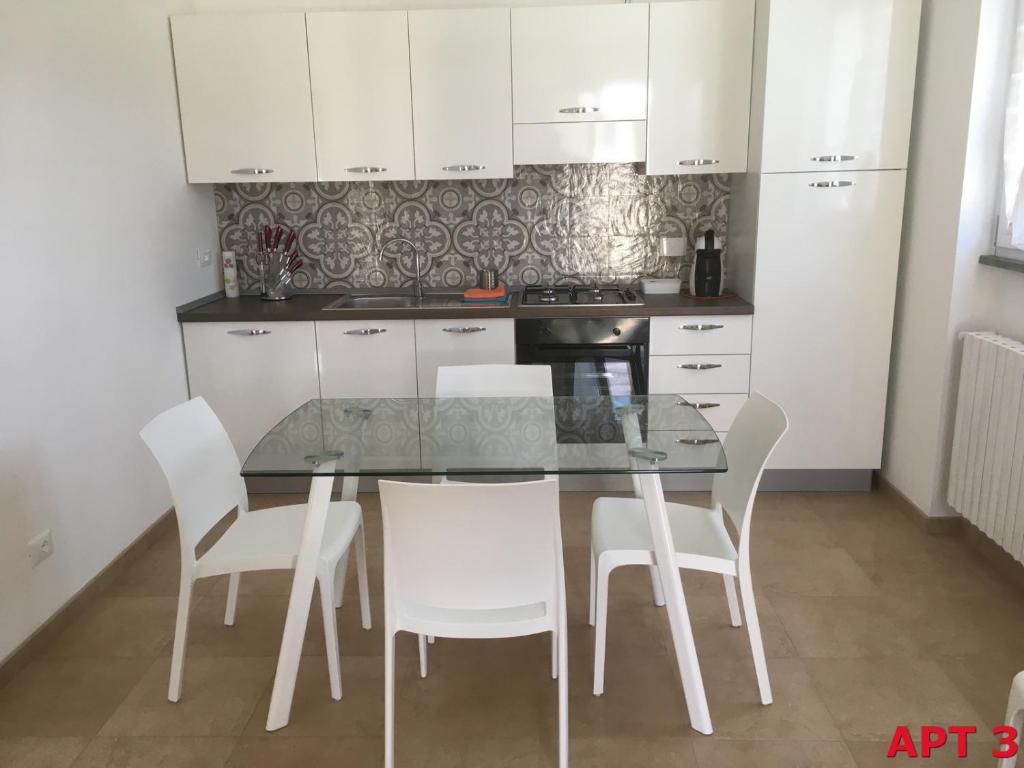 A kitchen or kitchenette at Agnese Apartments