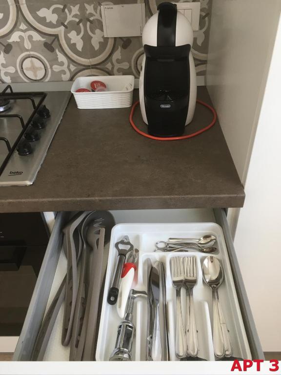 A kitchen or kitchenette at Agnese Apartments