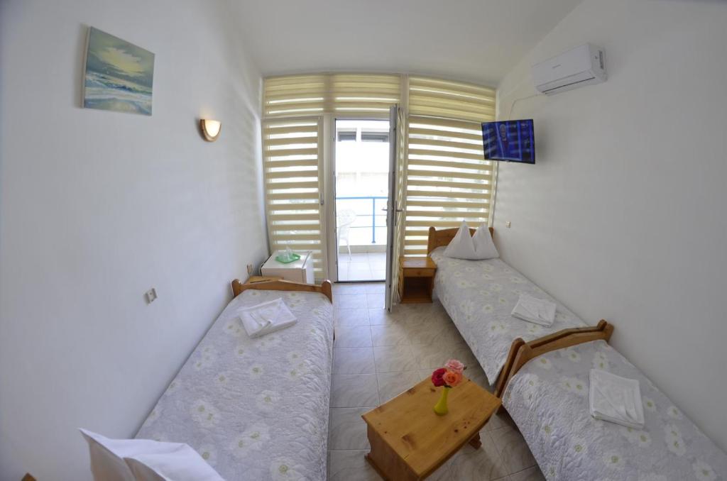 Postel nebo postele na pokoji v ubytování Complex Credo