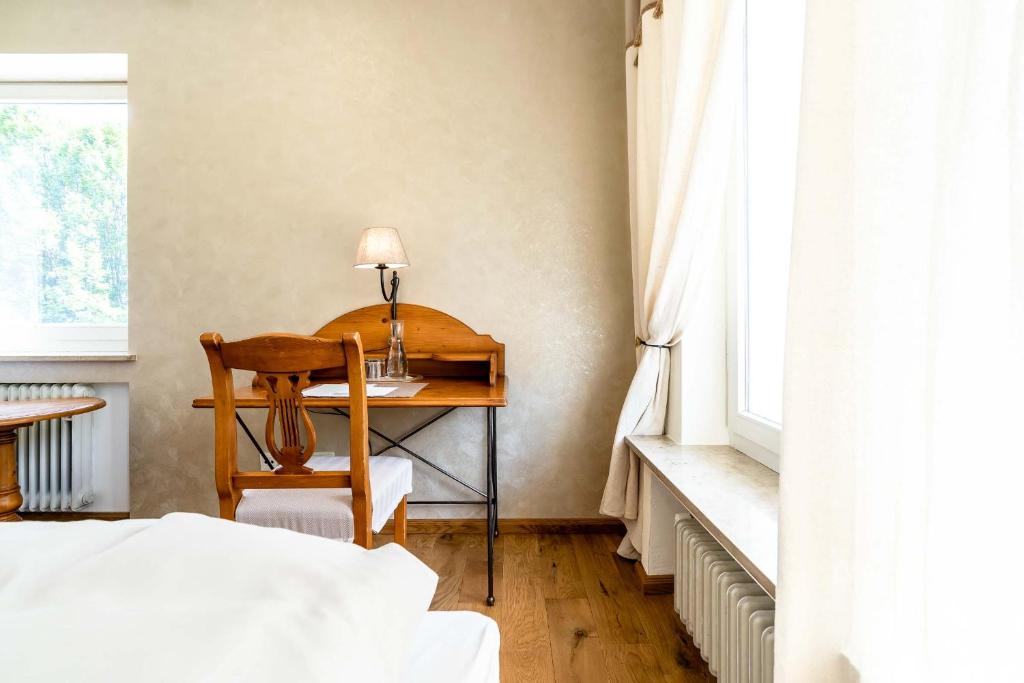 Postel nebo postele na pokoji v ubytování SEINZ Wisdom Resort - Bio-Hotel vegan-vegetarisch