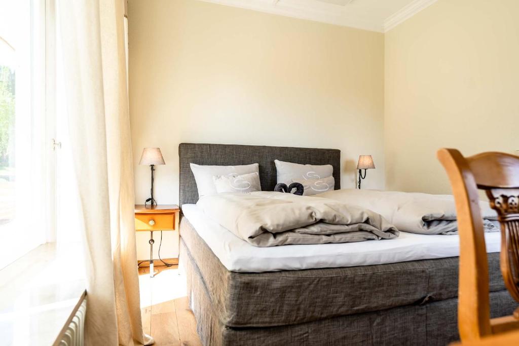 Postel nebo postele na pokoji v ubytování SEINZ Wisdom Resort - Bio-Hotel vegan-vegetarisch