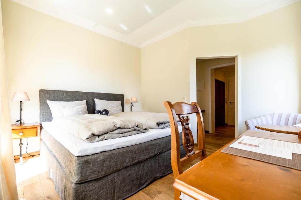 Postel nebo postele na pokoji v ubytování SEINZ Wisdom Resort - Bio-Hotel vegan-vegetarisch