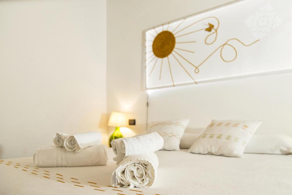 Postel nebo postele na pokoji v ubytování Sa Crai B&B - Sardinian Experience