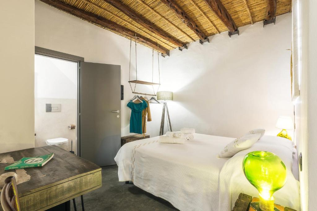 Postel nebo postele na pokoji v ubytování Sa Crai B&B - Sardinian Experience