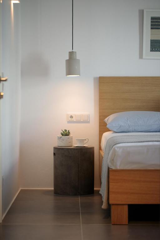 Postel nebo postele na pokoji v ubytování Vorta Naxos
