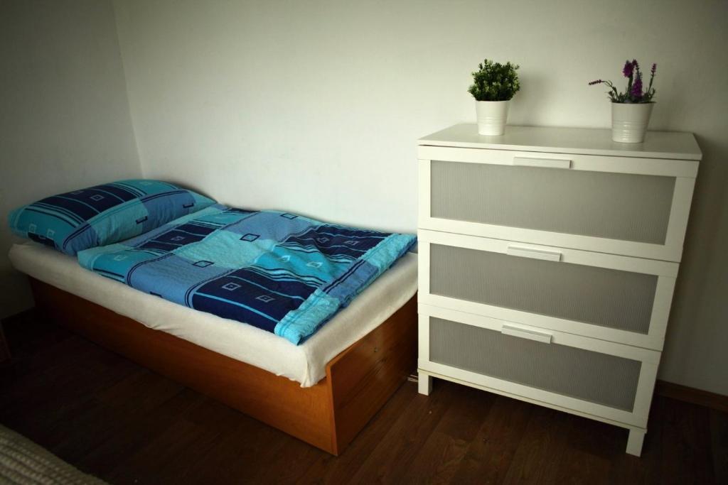 Letto o letti in una camera di Dům v Českém ráji