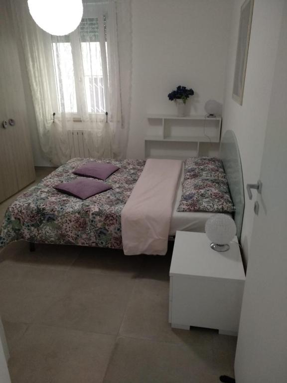 Łóżko lub łóżka w pokoju w obiekcie Angel B&B