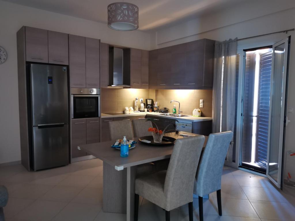 Kuchyň nebo kuchyňský kout v ubytování Eleni Apartment