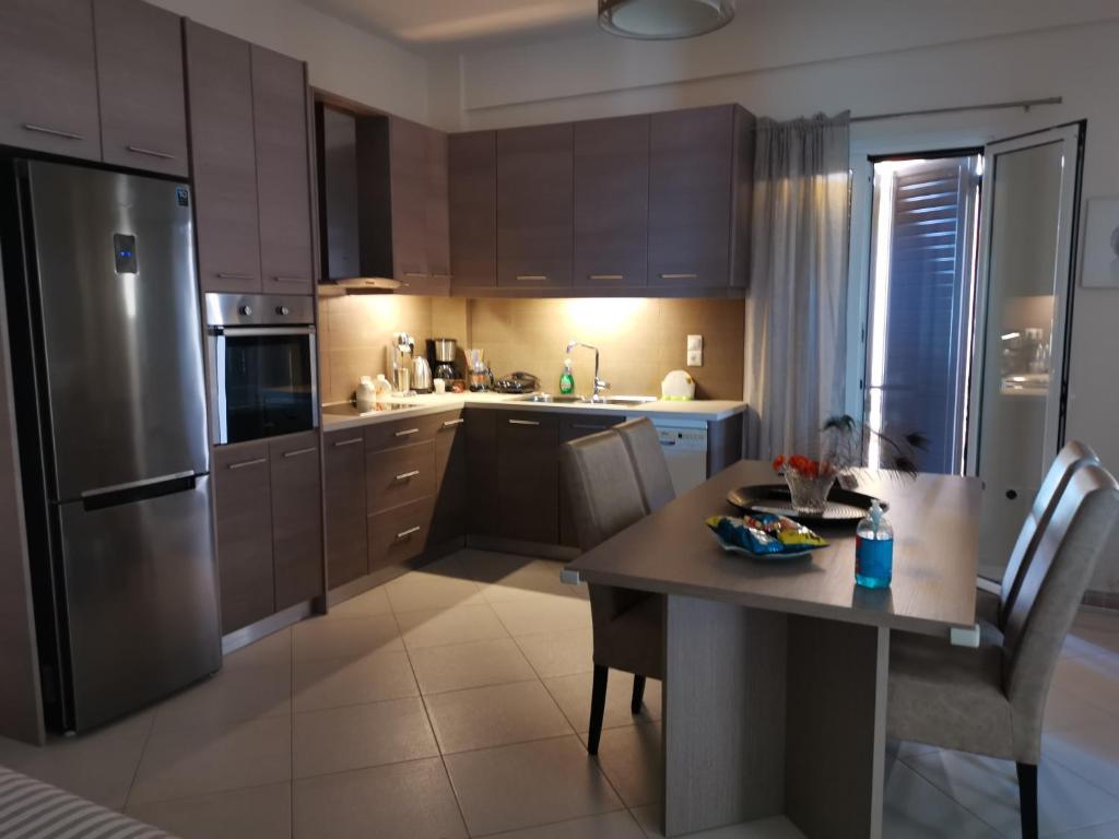 Kuchyň nebo kuchyňský kout v ubytování Eleni Apartment