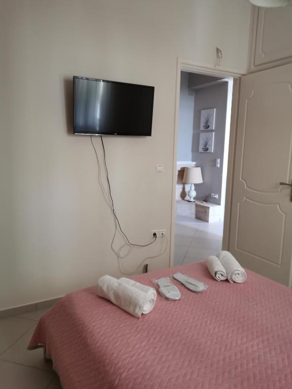 Postel nebo postele na pokoji v ubytování Eleni Apartment