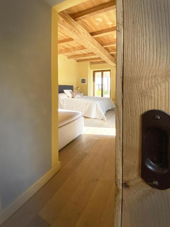 Postel nebo postele na pokoji v ubytování Agriturismo Missanega