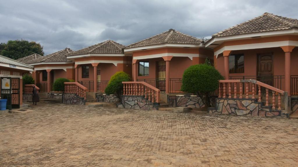 a row of houses in a row at Hotel Delambiance in Koboko