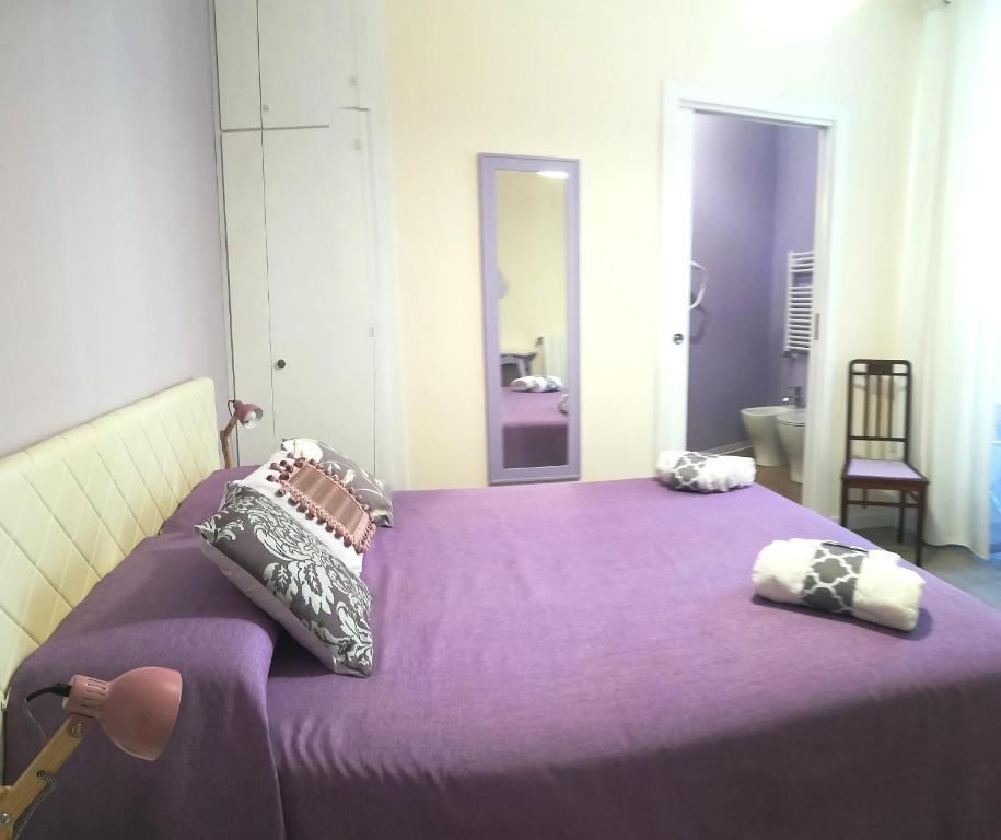 Łóżko lub łóżka w pokoju w obiekcie Persiane al Cassaro