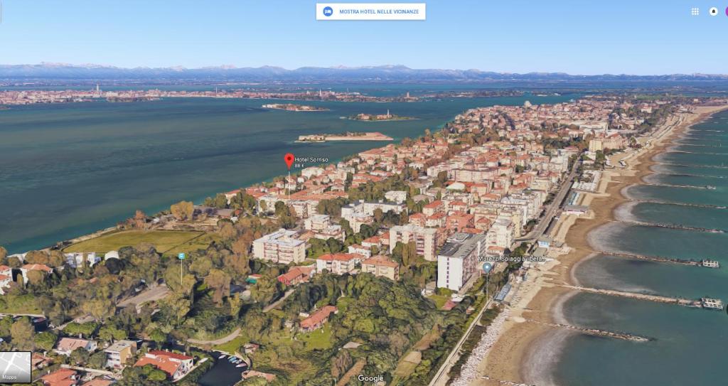 an aerial view of a city next to the water at Hotel Sorriso in Venice-Lido