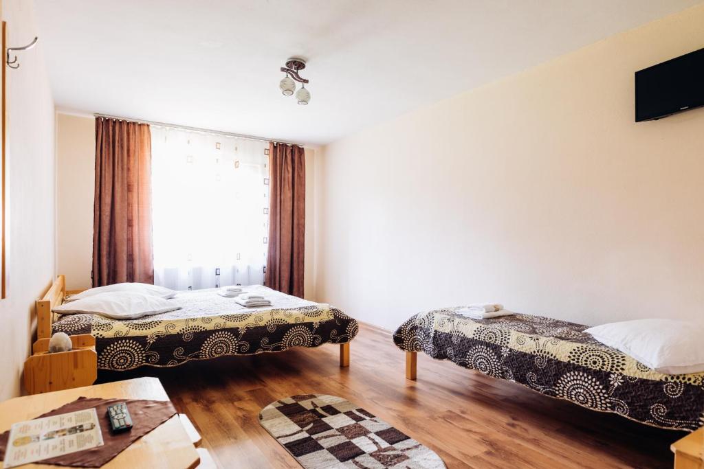 Postel nebo postele na pokoji v ubytování Iris 2