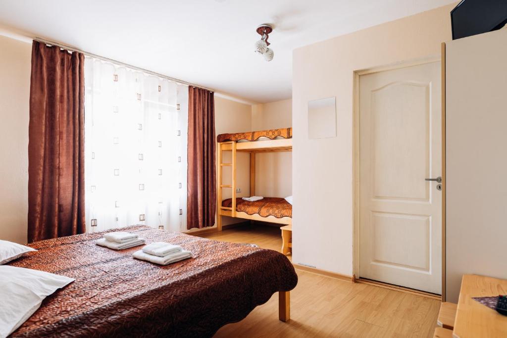 Postel nebo postele na pokoji v ubytování Iris 2