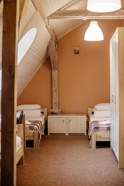 Postel nebo postele na pokoji v ubytování Guest House "Arkhistratyg"