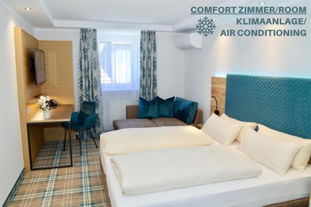 Postel nebo postele na pokoji v ubytování Hotel Zur Post
