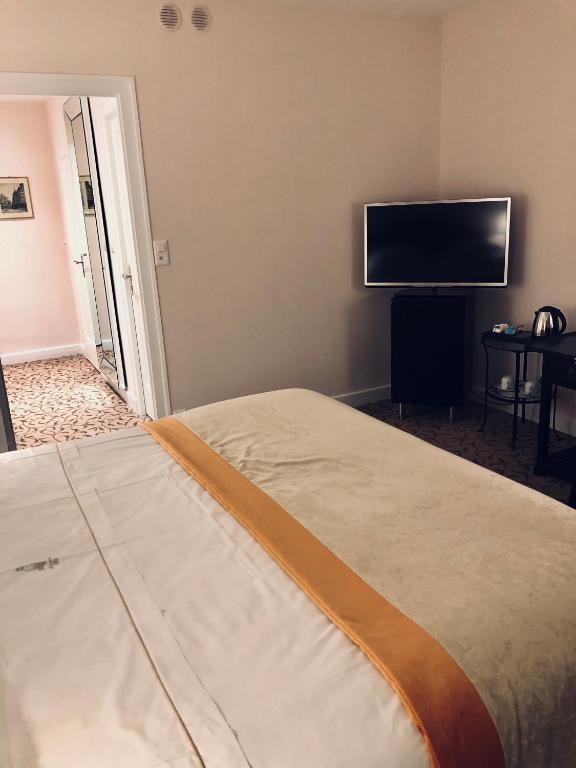 Postel nebo postele na pokoji v ubytování Hotel Adriatica