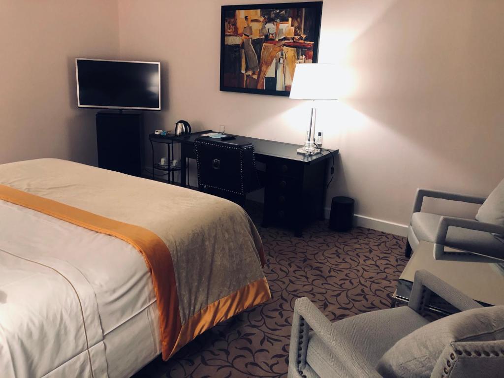 TV a/nebo společenská místnost v ubytování Hotel Adriatica