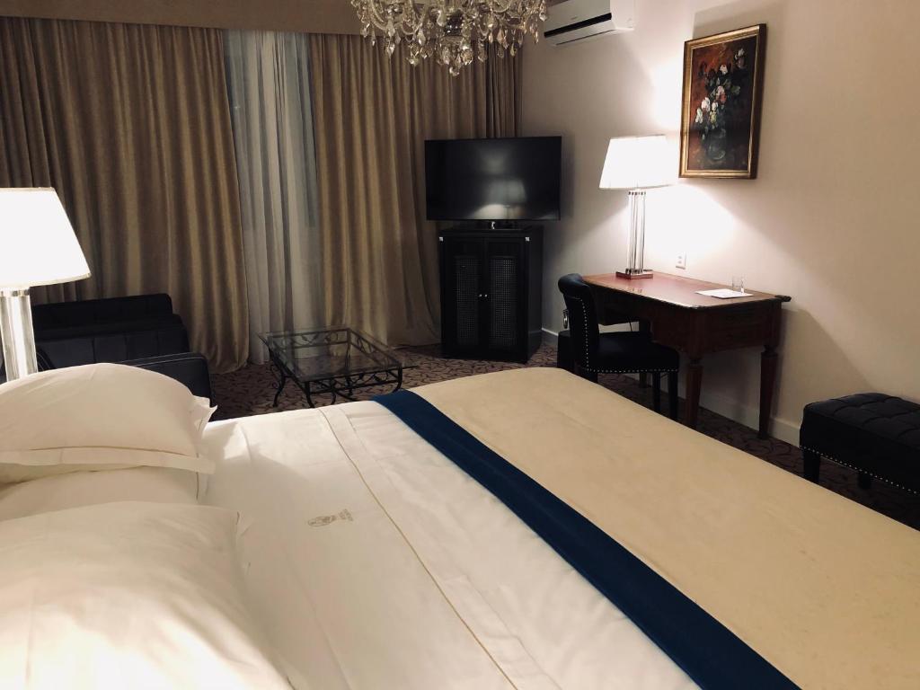 Postel nebo postele na pokoji v ubytování Hotel Adriatica