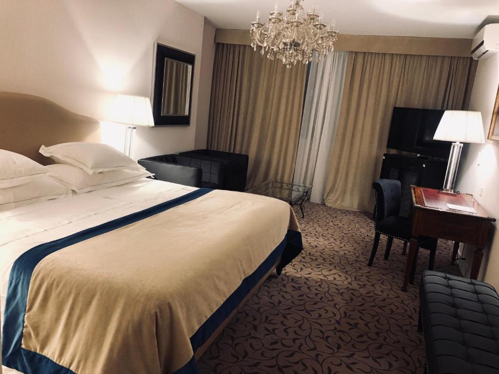 Postel nebo postele na pokoji v ubytování Hotel Adriatica